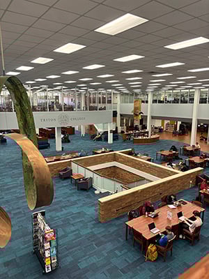 Overhead Photo Shot of Triton College Library with Students Sitting at Tables