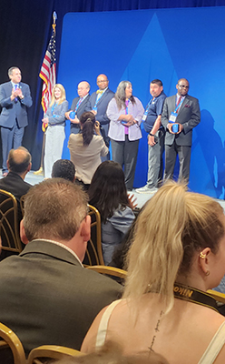 Photo of Calvin Washington accepting his ACBSP Award