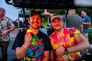 Golfers ready for tee off in their cart 