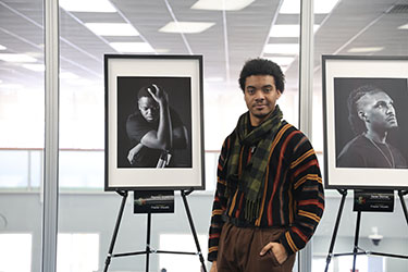Photo of Ethan Frazier standing in Photo Gallery dispaly