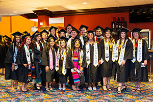 Photo of Group of Graduates with Honors sashes