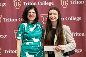 Photo of President Moore with Triton Student