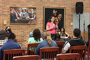 Photo of Hillary Meyer addressing graduates
